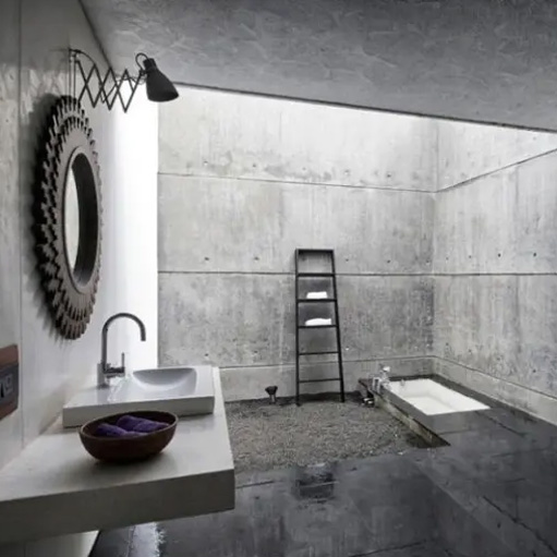 A completely amazing and very bold interior, in which concrete appears everywhere – on the walls, on the floor and on the ceiling. Project: SPASM Design Architects